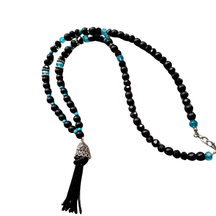 Handmade black and blue men's design necklace, it is designed with crystal and onyx natural stone, the tip is made of steel and leather.