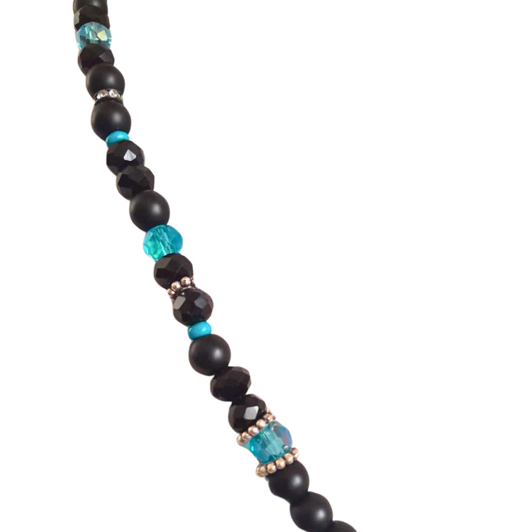 Handmade black and blue men's design necklace, it is designed with crystal and onyx natural stone, the tip is made of steel and leather.