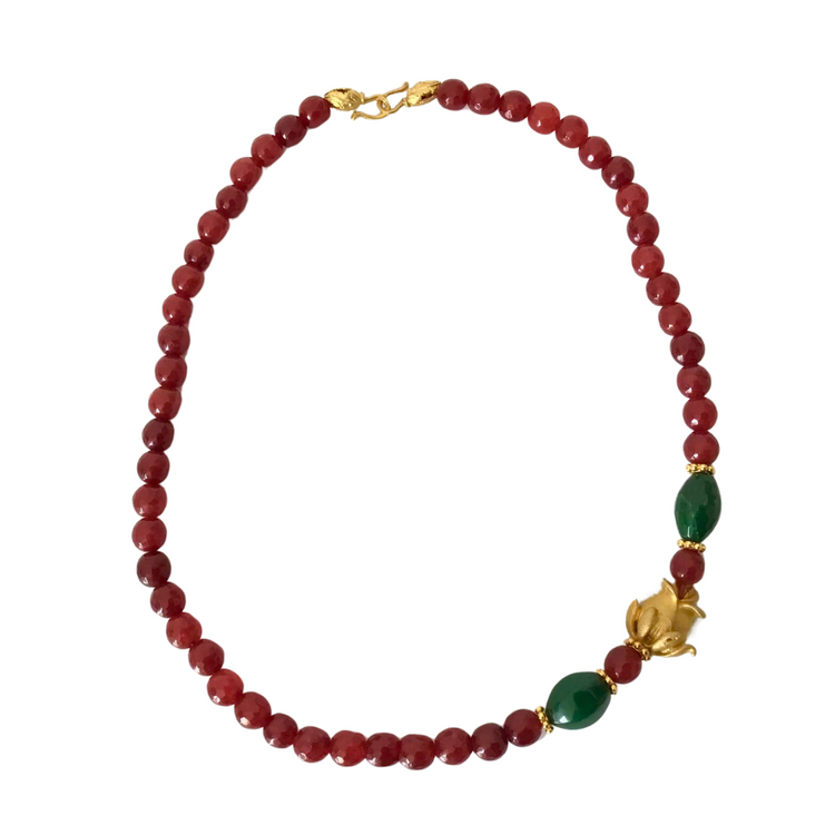 Handmade genuine stoned ruby and emerald necklace with a gold figure.