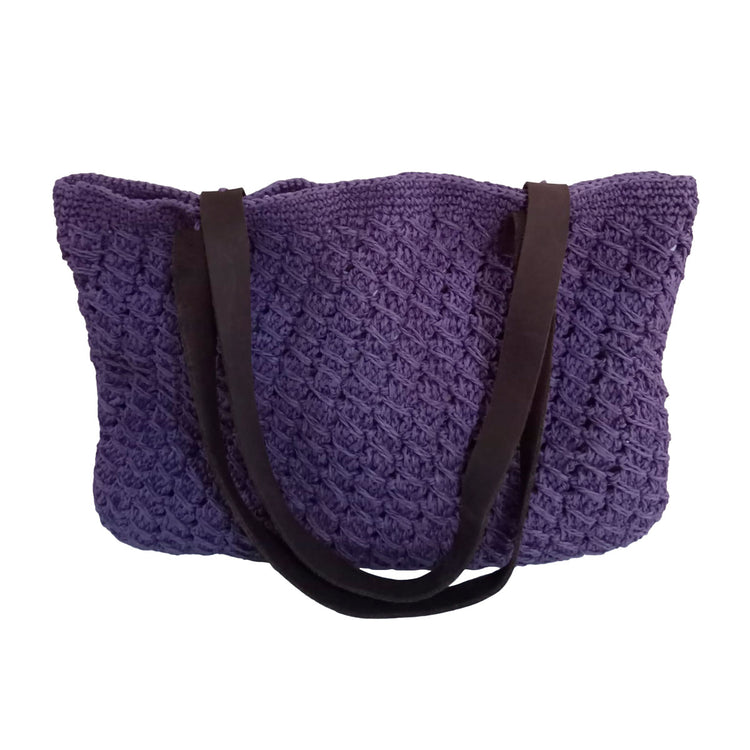 Hand crocheted and crafted paper rope, lined, purple with brown leather straps tote.