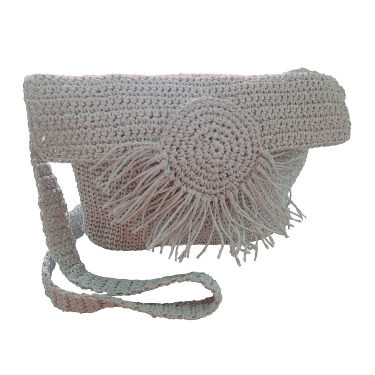 Handmade lined light grey wicker bag with tassel detail in front.