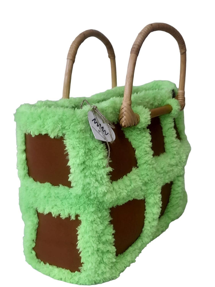 Handmade, genuine leather, fur string bonded, bamboo handle reversible green bag.