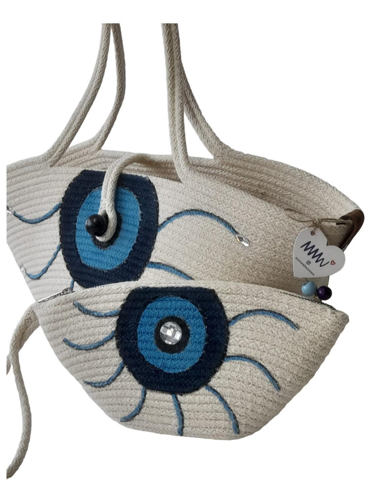 Handmade, hand painted, evil eye protection patterned, Tres double bag, shiny stone detail on the smaller bag.