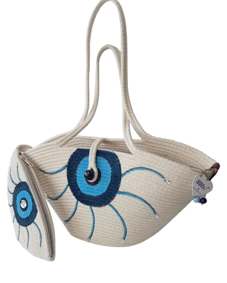 Handmade, hand painted, evil eye protection patterned, Tres double bag, shiny stone detail on the smaller bag.