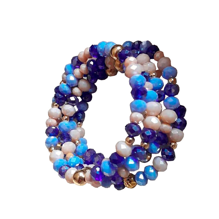 Handmade, special design blue and gold bracelet, made of crystals, brass plated stones and beads.