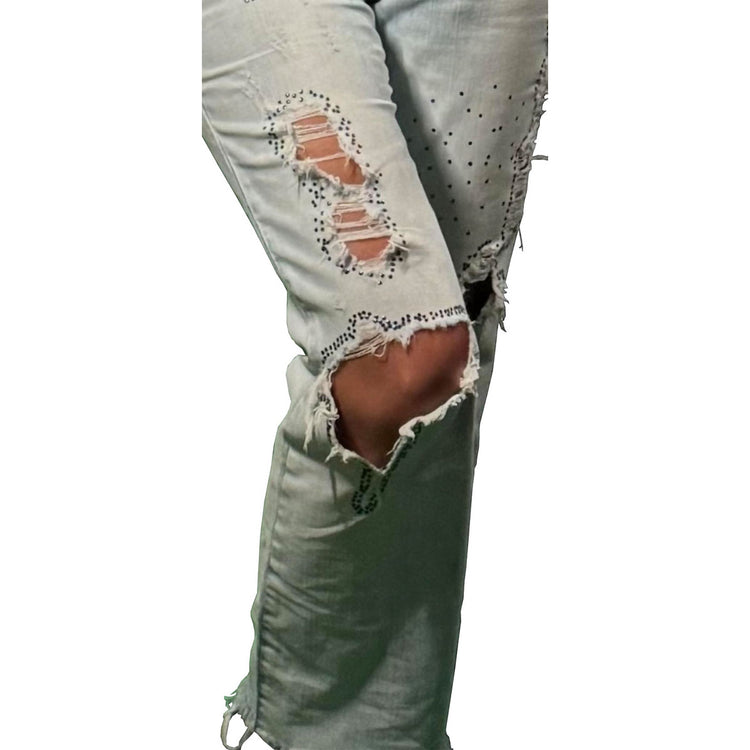 Specially designed, hand embroidered ripped jeans, the torn areas are hand embroidered with crystal shiny stones.