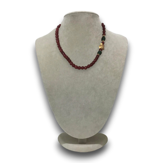 Handmade genuine stoned ruby and emerald necklace with a gold figure.