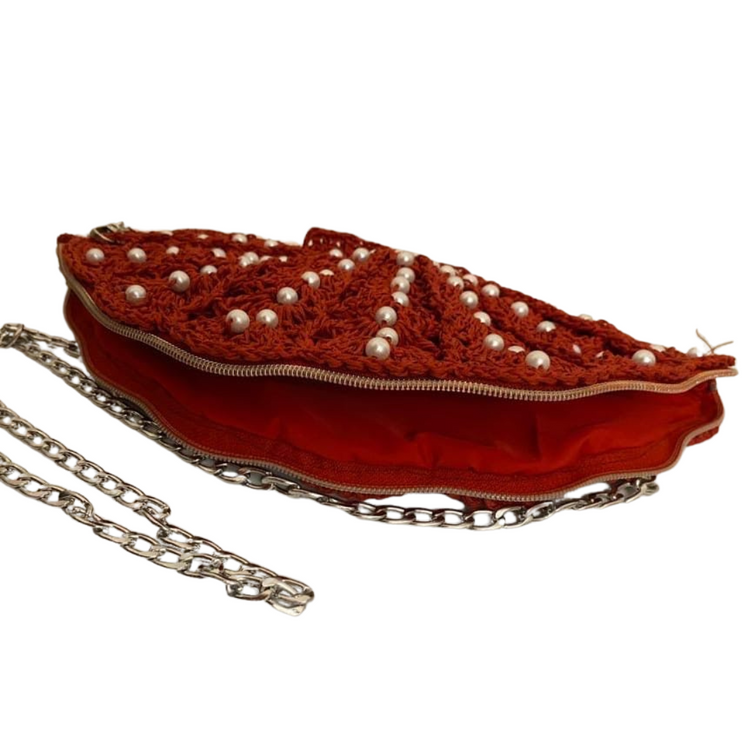 Hand crocheted and crafted wicker, pearl embroidered red oyster bag, lined, zip closure, long silver chain strap.