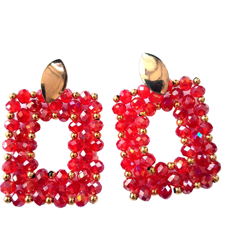 Very stylish handmade design earrings, consisting of red shiny crystal stones and gold color stones.