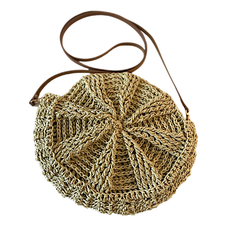 Handmade lined adjustable leather strap mussel pattern wicker bag.