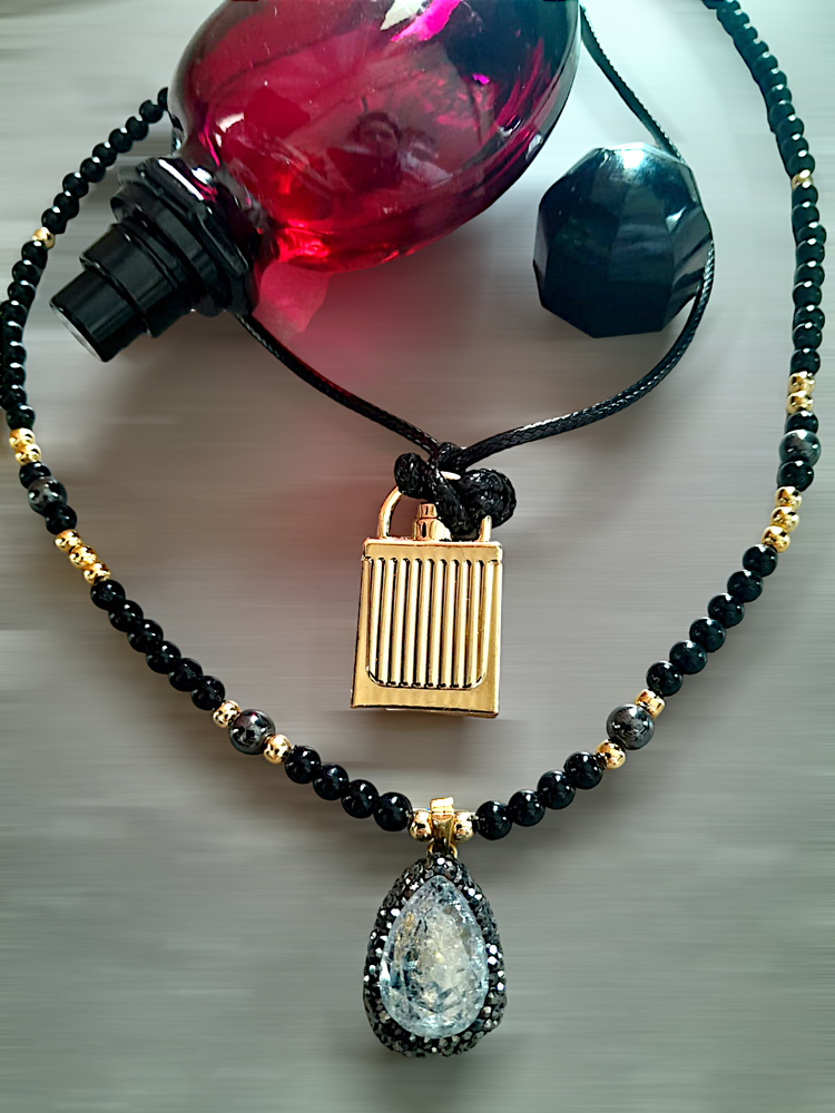 Specially designed, handmade double necklace with black and gold beads and gray crystal.