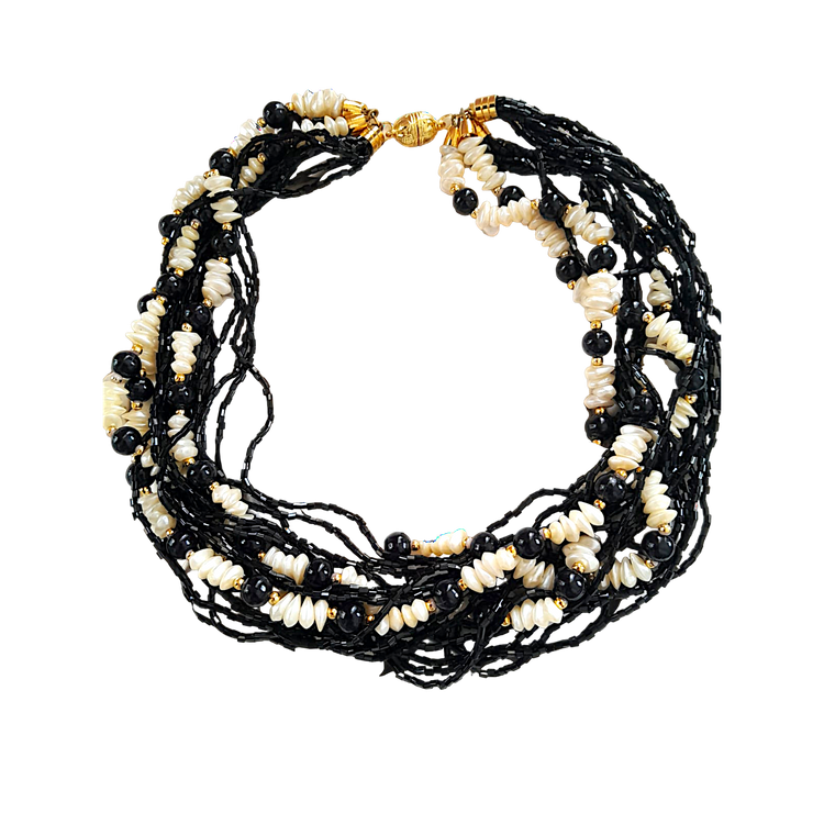 Handmade wrap necklace consisting of natural and genuine mother-of-pearl stones