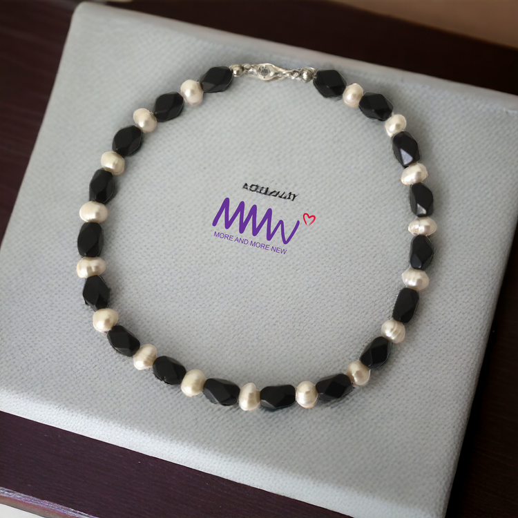 Handmade genuine stoned black agate and pearl necklace.