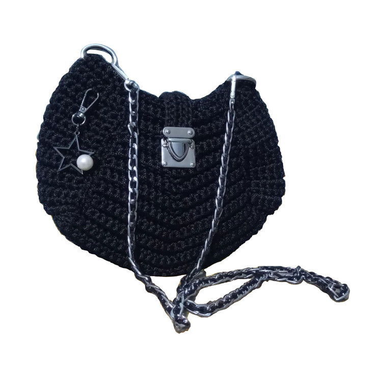 Hand crocheted and crafted macrame polyester black night bag with  metal accessories and silver chain.