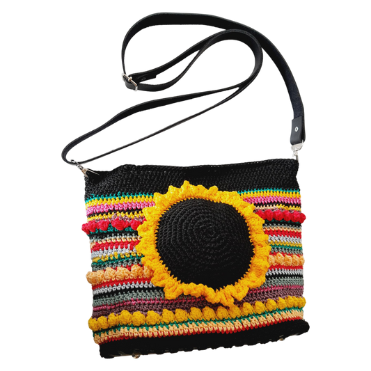 Hand Crafted lined macrame sunflower bag with adjustable leather strap.